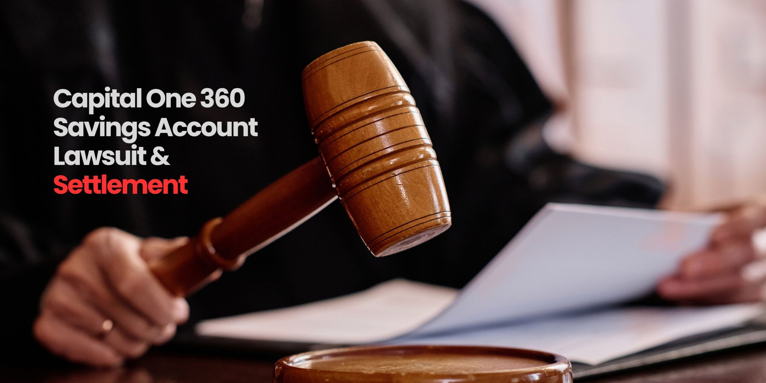 Gavel on a judge’s desk representing the Capital One 360 Savings Account lawsuit and settlement, with documents in the background.