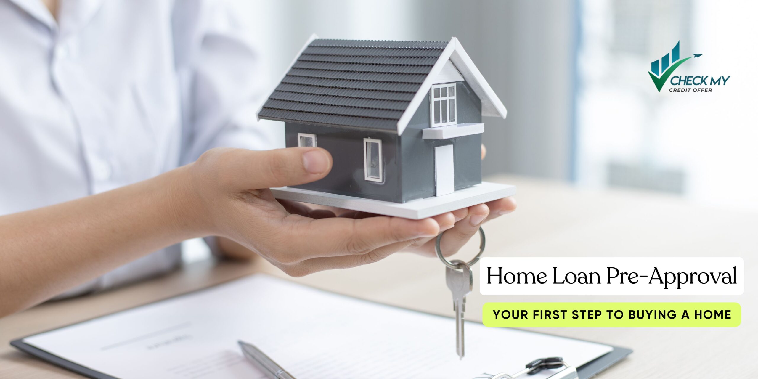 Home Loan Pre-Approval – Hands holding house model and key, symbolizing mortgage approval process.